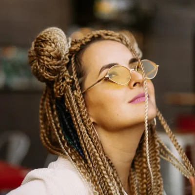 Young beautiful multiracial woman with blonde afro hairstyle bra